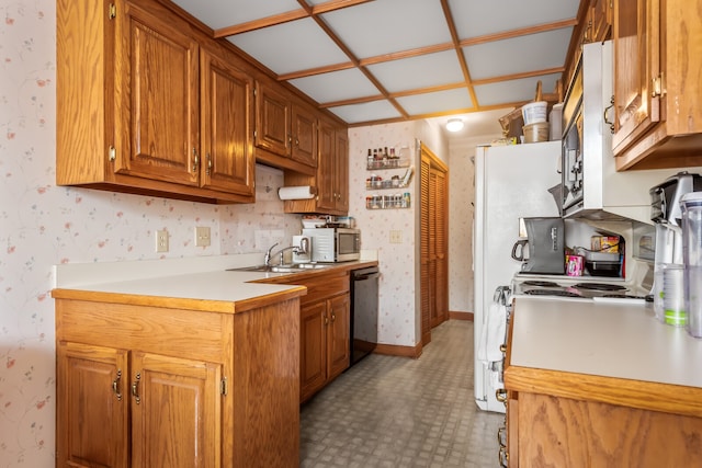 kitchen featuring black dishwasher, white range oven, and sink