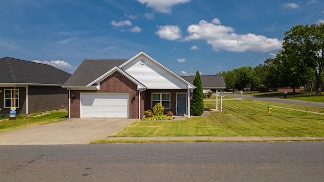 ranch-style house featuring a front yard and a garage