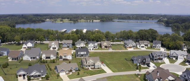 birds eye view of property with a residential view and a water view