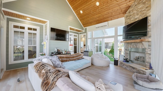 living room featuring high vaulted ceiling, a fireplace, hardwood / wood-style flooring, a wall mounted air conditioner, and wood ceiling