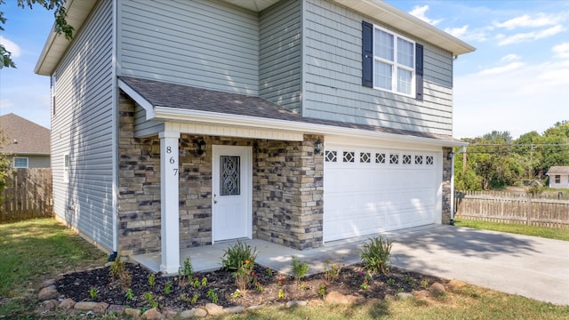 front of property featuring a garage