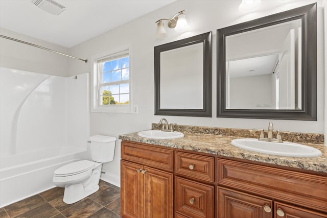 full bathroom featuring vanity, toilet, shower / washtub combination, and tile patterned flooring