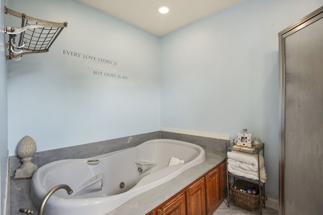 bathroom featuring a tub to relax in