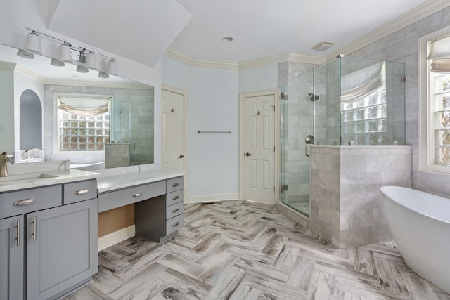 bathroom featuring independent shower and bath, parquet flooring, and vanity