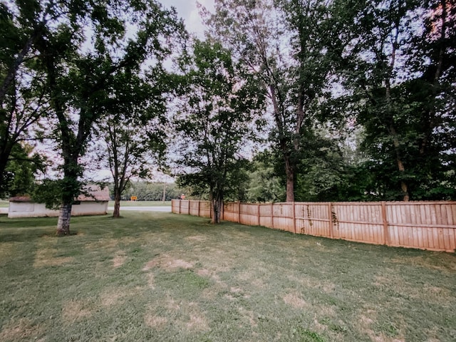 view of yard with fence