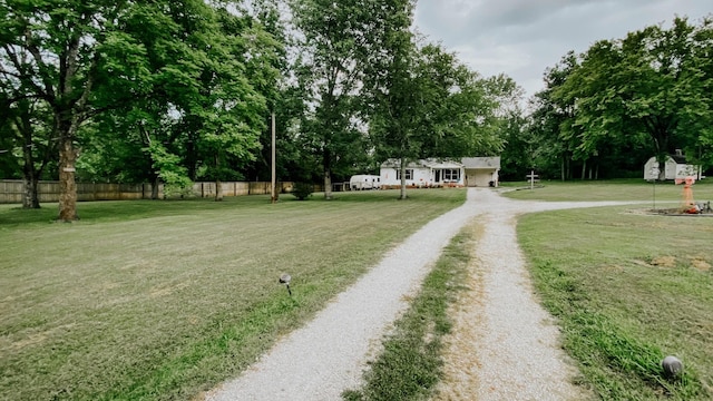 view of street featuring driveway