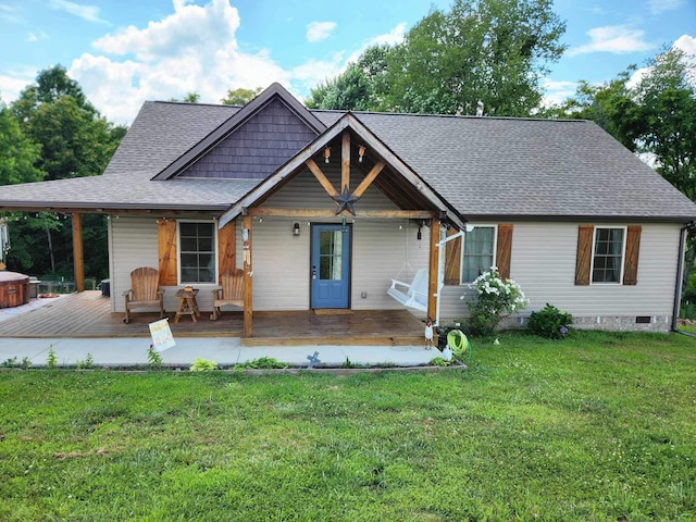 view of front of house with a porch, crawl space, a shingled roof, and a front lawn