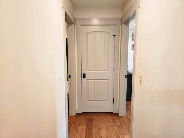 hallway with light wood-style flooring