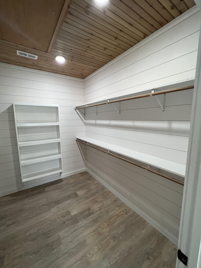 spacious closet with wood finished floors and visible vents