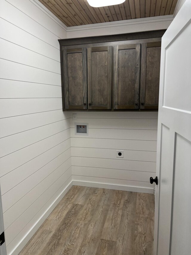 laundry room with electric dryer hookup, cabinets, light hardwood / wood-style floors, and wood ceiling