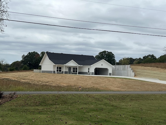 view of front of property with an attached garage and driveway