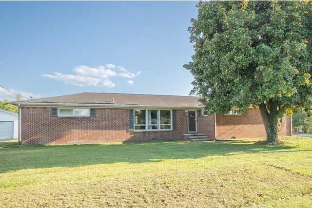 view of front facade with a front lawn