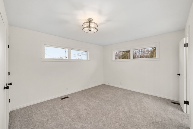 view of carpeted spare room