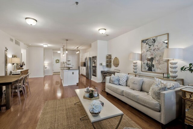 living room with hardwood / wood-style floors