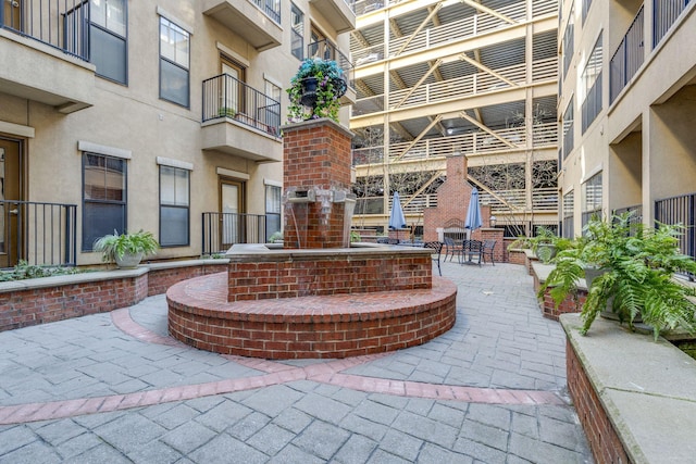 view of home's community with a patio