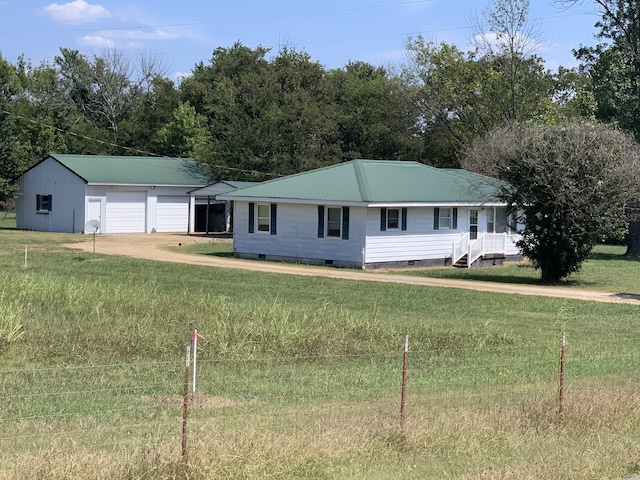 single story home with a garage and a front lawn