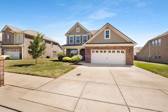 craftsman-style house featuring a garage and a front lawn