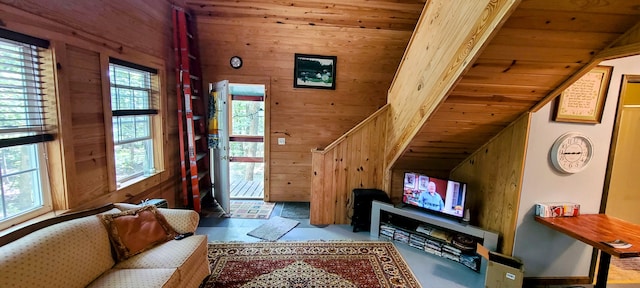 living room with wooden walls and lofted ceiling