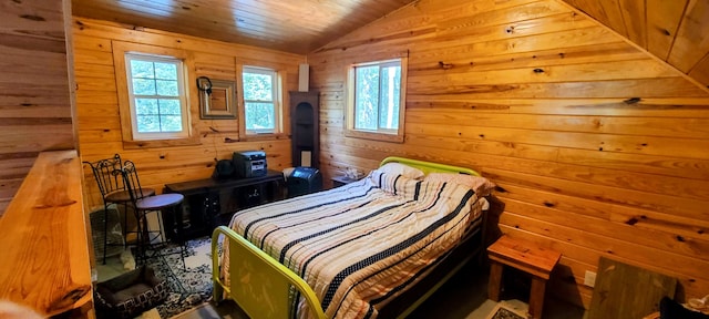 bedroom featuring lofted ceiling and wooden ceiling