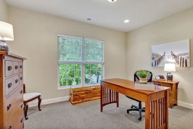 office space with light colored carpet