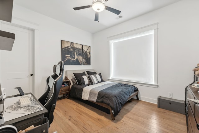 bedroom featuring ceiling fan and light wood-type flooring