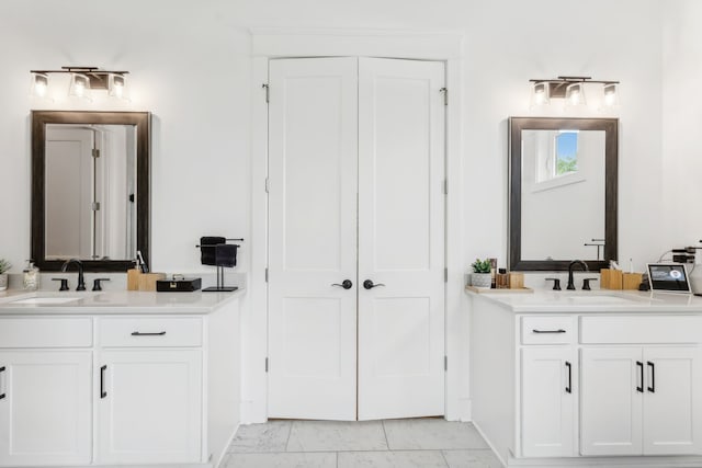 bathroom with vanity and tile patterned floors