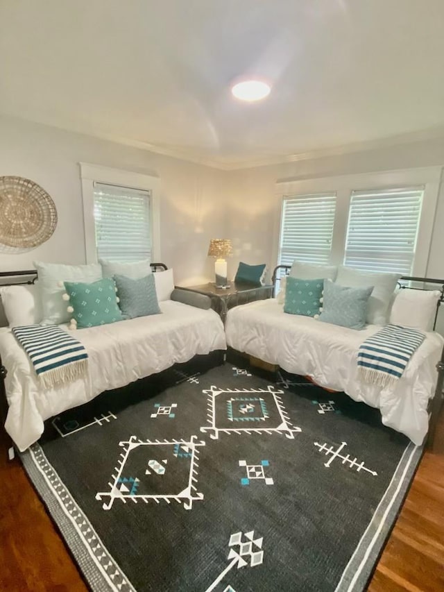 bedroom with wood finished floors