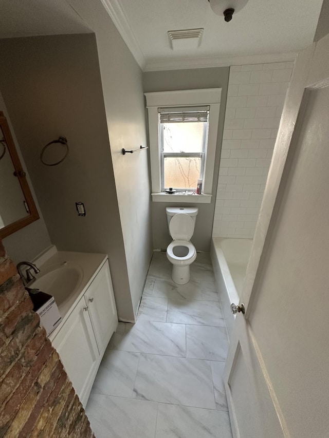 bathroom featuring visible vents, crown molding, toilet, marble finish floor, and vanity