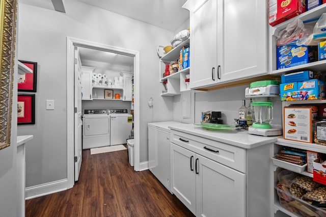 kitchen featuring white cabinets, dark wood-style floors, light countertops, washing machine and dryer, and open shelves