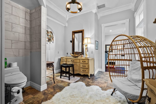 interior space featuring arched walkways, visible vents, stairway, ornamental molding, and baseboards