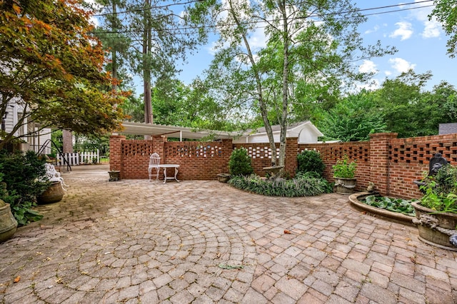 view of patio / terrace with fence