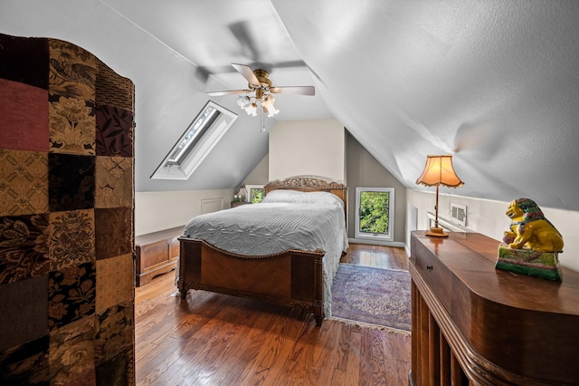 bedroom with lofted ceiling, ceiling fan, and wood-type flooring