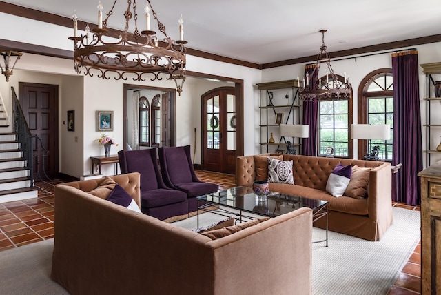 living room with tile patterned floors, french doors, an inviting chandelier, and stairs