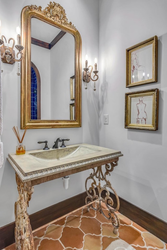 bathroom featuring a sink and wood finished floors