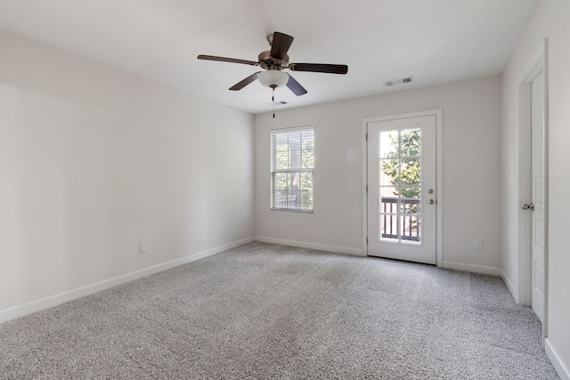 unfurnished room featuring carpet floors and ceiling fan