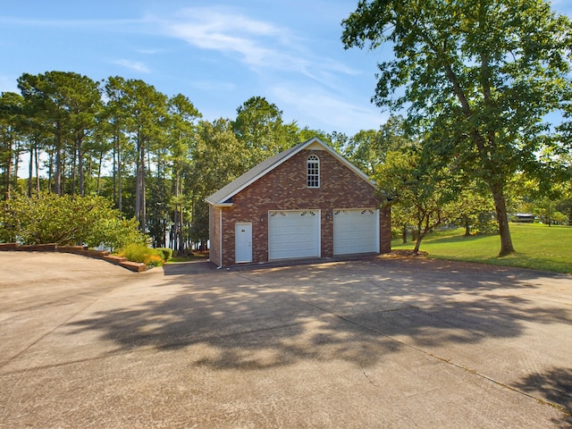 garage with a lawn