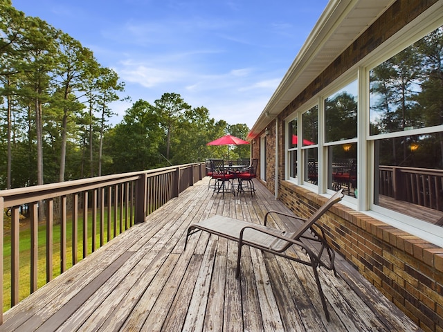 deck featuring a yard