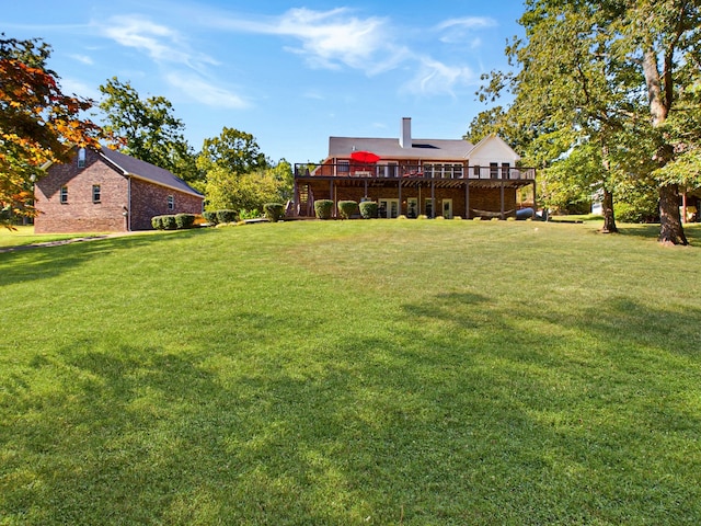 view of yard featuring a deck