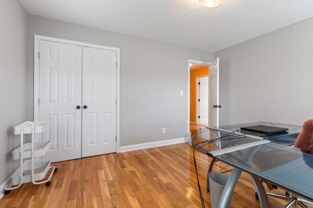 office area with hardwood / wood-style floors