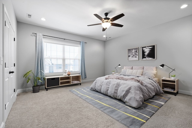 bedroom with carpet floors, ceiling fan, and a closet