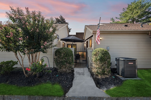 view of front of property featuring central AC unit