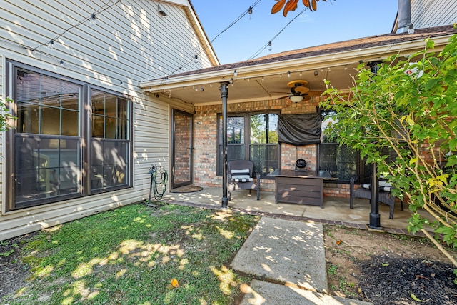 exterior space featuring ceiling fan and a patio