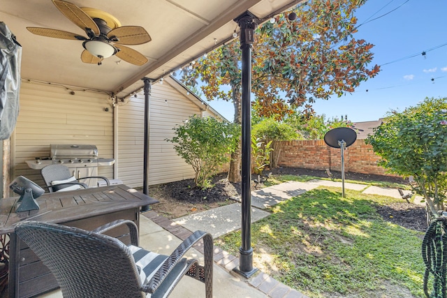 view of patio / terrace featuring ceiling fan