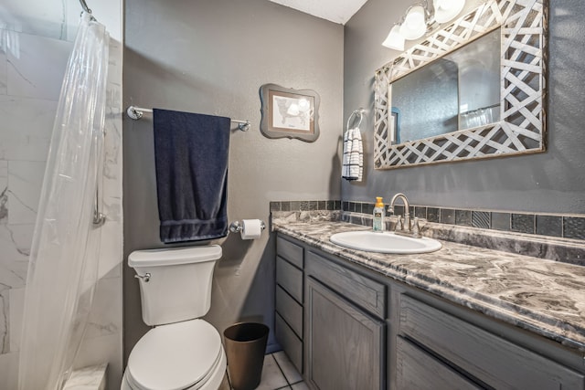 bathroom with tile patterned flooring, toilet, walk in shower, and vanity