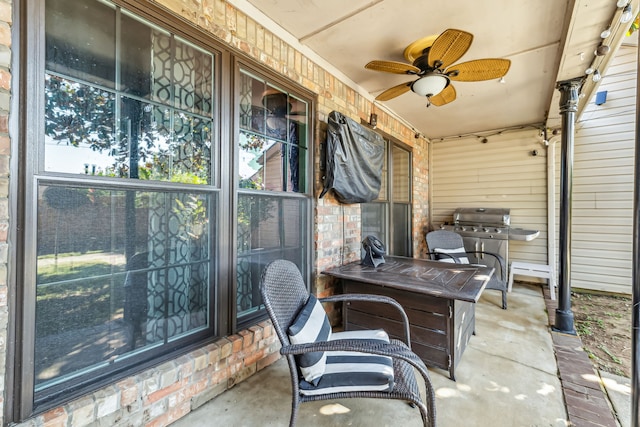 view of patio with ceiling fan