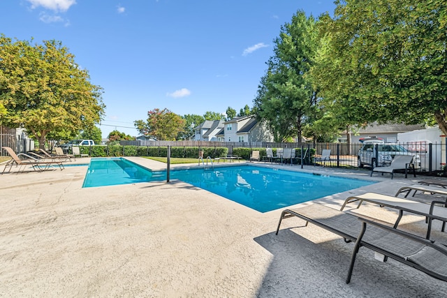 view of swimming pool with a patio area