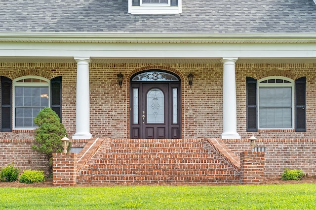 doorway to property with a porch