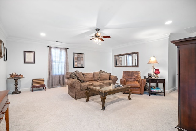 carpeted living room featuring crown molding and ceiling fan