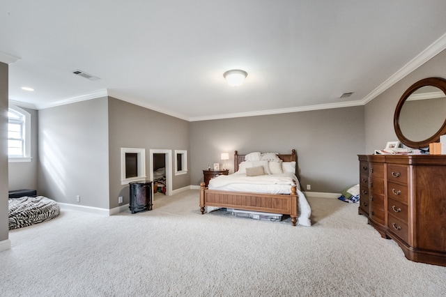 bedroom with ornamental molding and light colored carpet