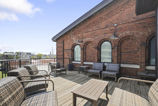 610 21st Ave N Unit 101, Nashville, TN 37203 - wooden deck featuring an outdoor hangout area